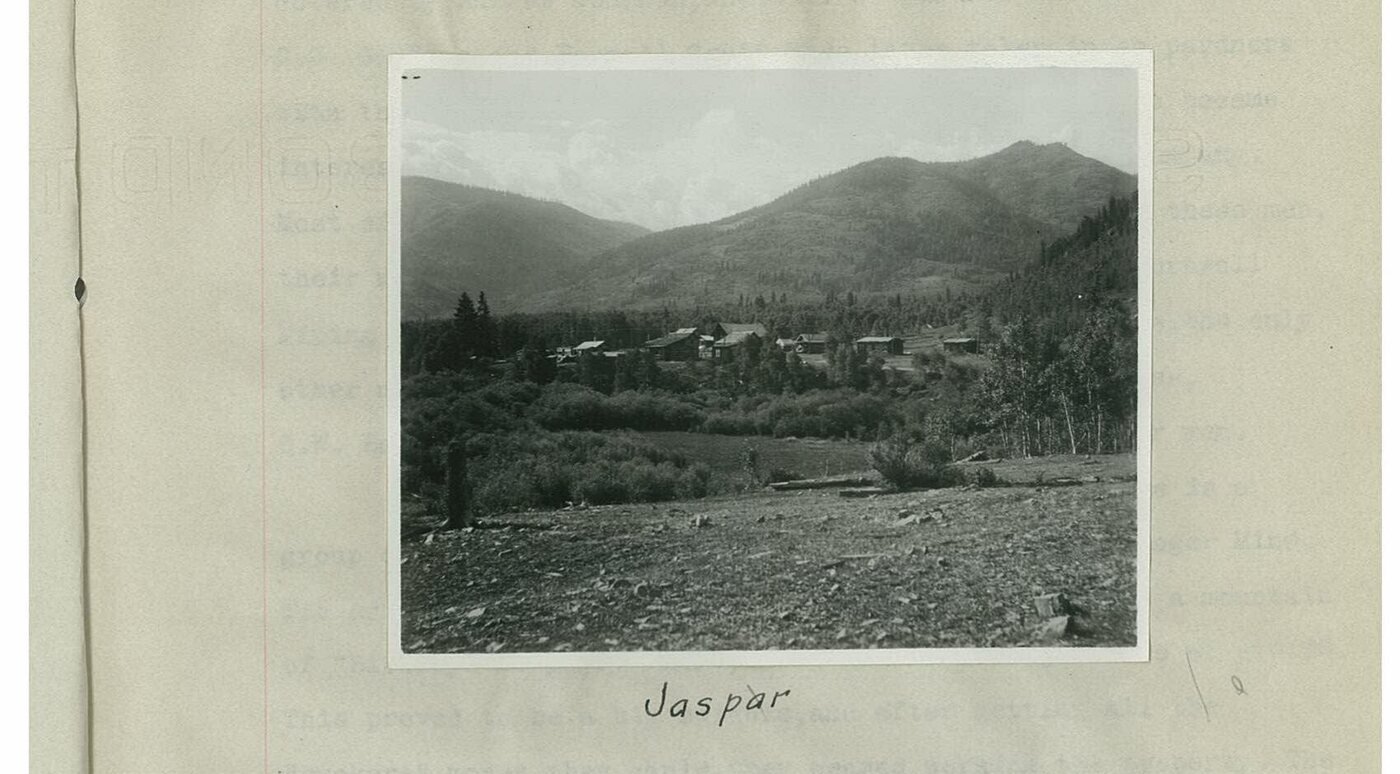 Photograph of the town of Jaspar in its valley, mounted in a Colorado School of Mines thesis and captioned by hand