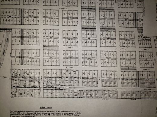 Surveyed plat sheet with numbered lots and a survey note referencing the 1895 resurvey