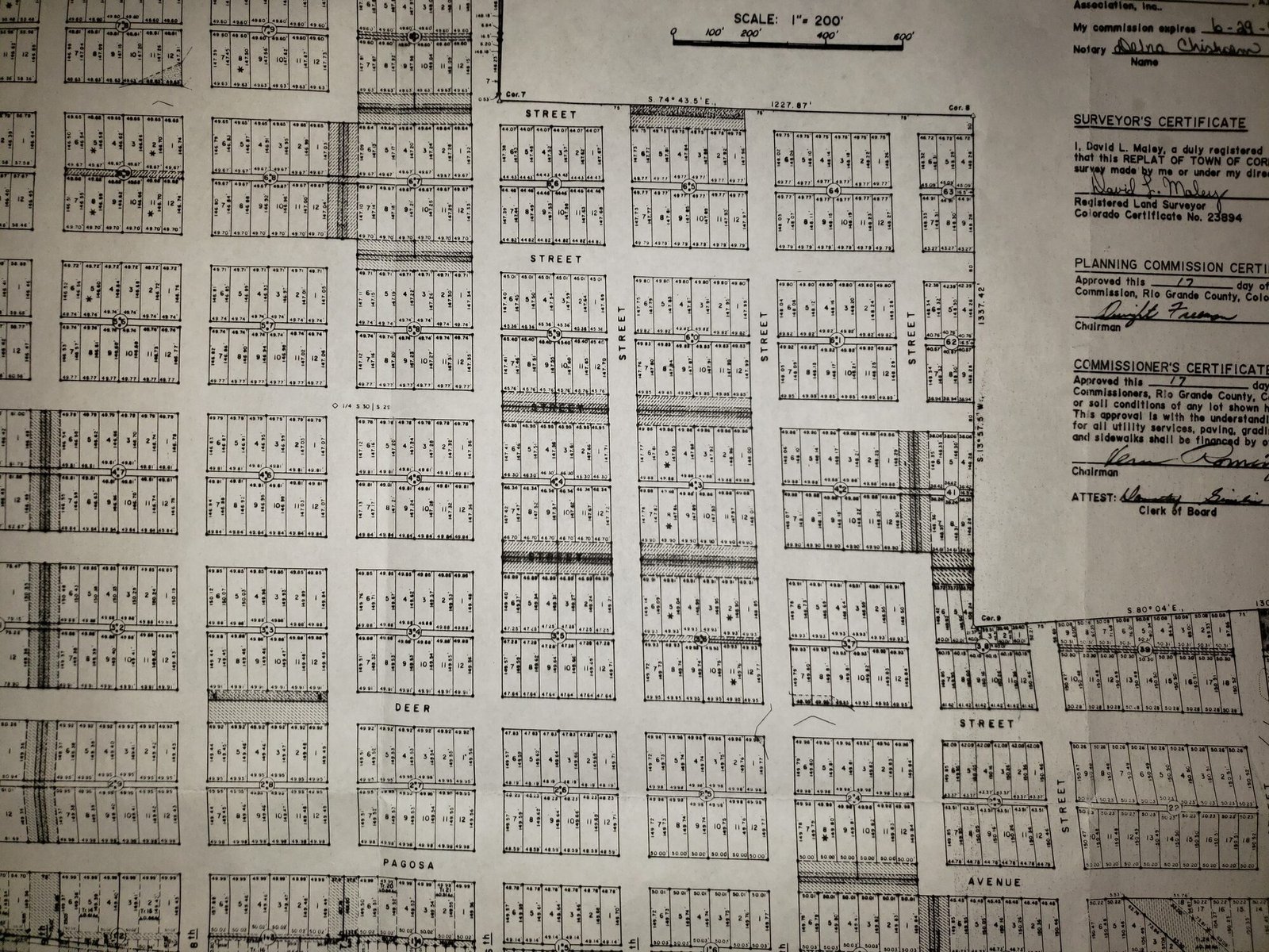 Surveyed plat sheet showing numbered lots and streets