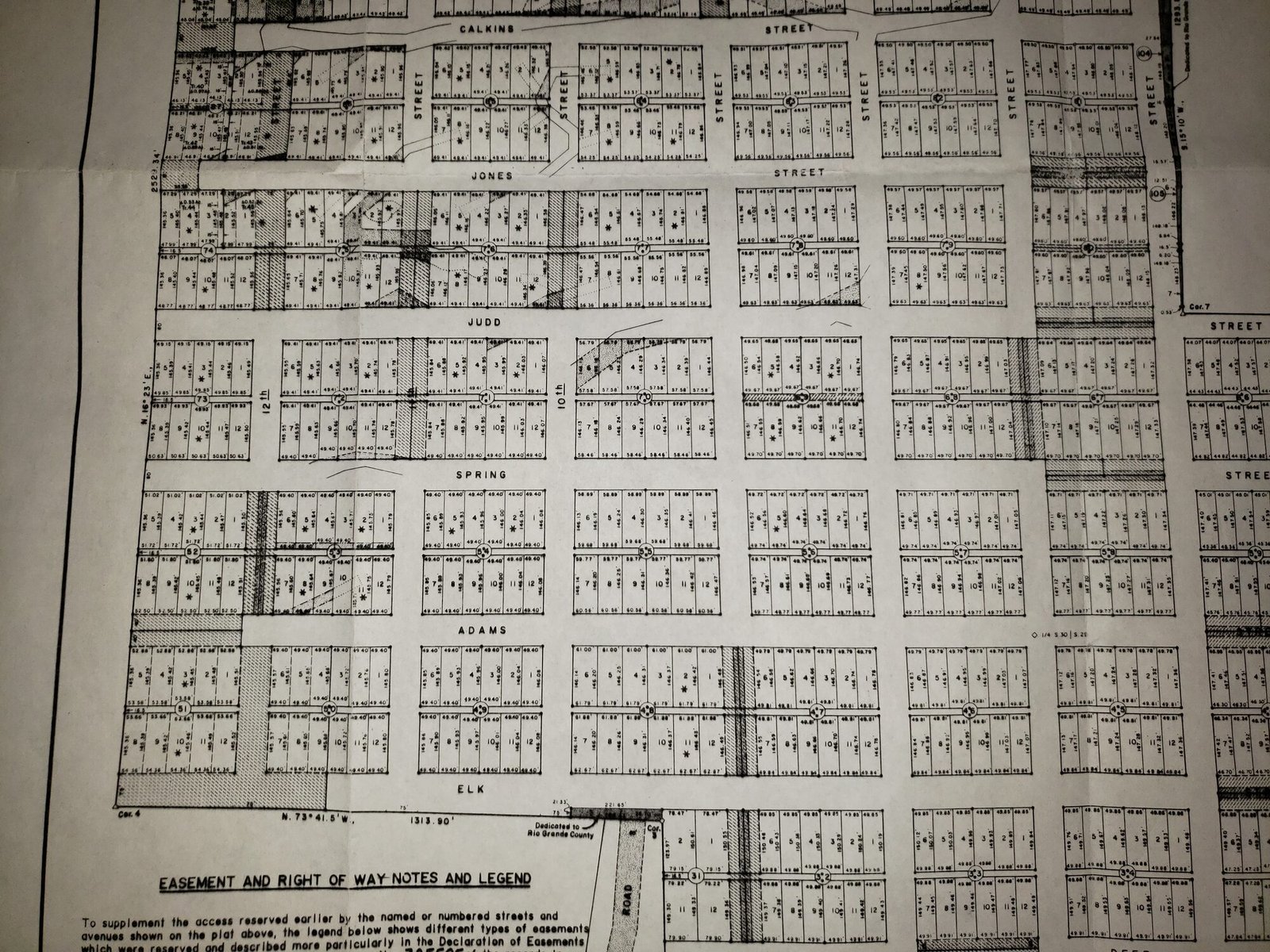 Surveyed plat sheet showing numbered lots and streets