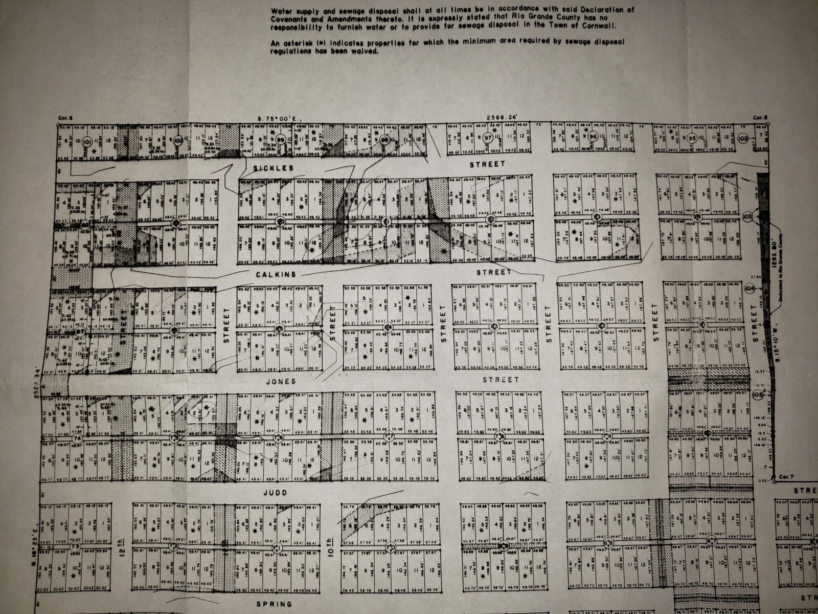 Surveyed plat sheet showing numbered lots and streets