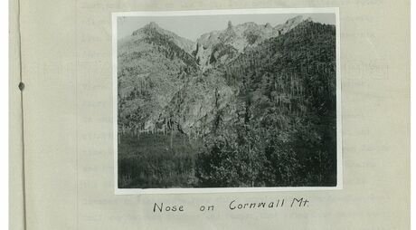 Black and white photograph mounted on a page, hand captioned: Nose on Cornwall Mt.