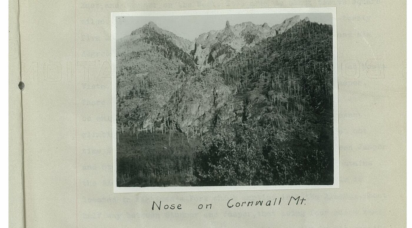 Black and white photograph mounted on a page, hand captioned: Nose on Cornwall Mt.
