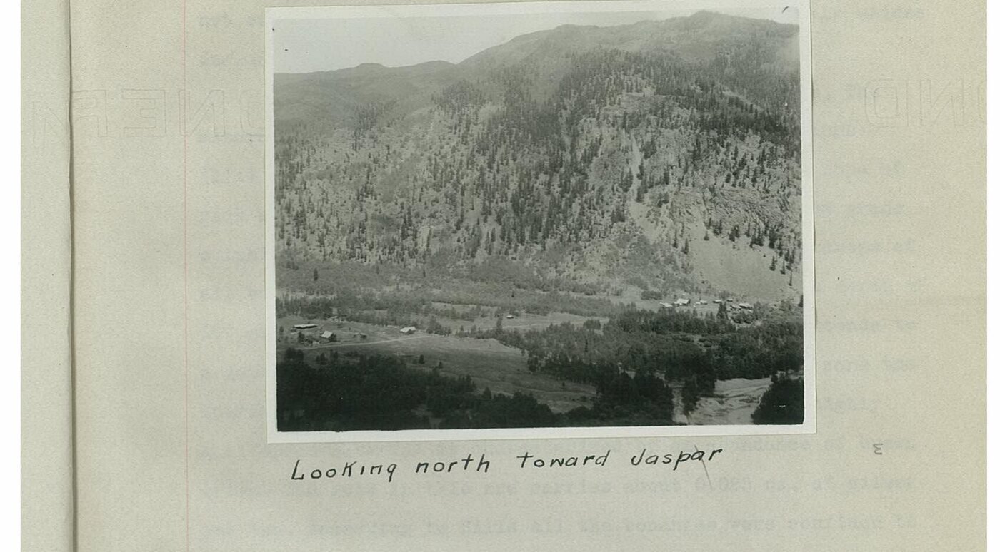 Black and white photograph mounted on a page, hand captioned: Looking north toward Jaspar