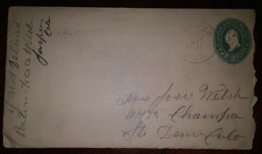 A worn cream envelope with a green two cent United States Postage indicium, a faint circular Jasper Colo. postmark, an address in pencil to Miss Josie Welsh on Champa Street in Denver, and a return instruction written in ink sideways up the left edge